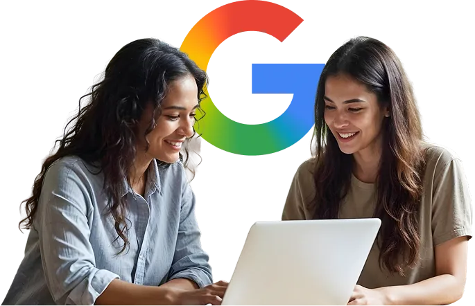 Two coworkers smiling while collaborating on a laptop, with the Google logo behind them